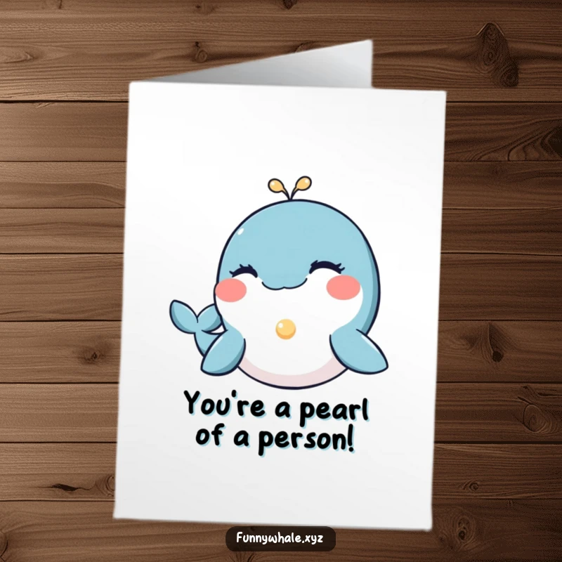 Funny Free Printable Birthday Card: Whale winking charmingly and offering a glowing pearl, a special birthday treasure. Downloadable.